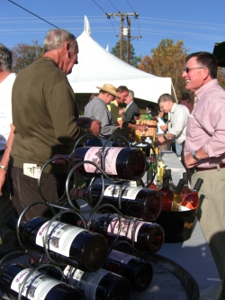 Guests at the Toasting Ceremony for the Port of Leonardtown Winery enjoy locally produced wines. SMECO is scheduled to start burying the unsightly overhead power lines next week.