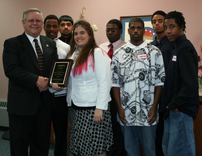Youth members of LifeStyles of Maryland, Inc. recently presented a plaque to Charles County Commissioner President Wayne Cooper for his continued dedication to the youth of Charles County.
