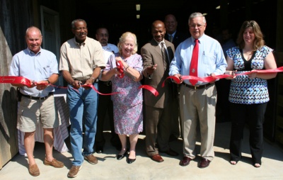 Representatives from Charles, St. Mary's, and Calvert Counties joined the staff of the Tri-County Animal Shelter in Hughesville to dedicate their newly renovated barn on June 13, 2008. The project added additional stalls, as well as water and electrical services, to the barn and completely shields the animals within it from the elements. The project was completed by members of the Charles County Department of Public Facilities. (Pictured left to right) St. Mary's County Commissioner President Jack Russell, Calvert County Commissioner President Wilson Parran, Calvert County Commissioner Linda Kelley, Charles County Commissioner Reuben B. Collins, II, Charles County Commissioner President Wayne Cooper, and Kim Stephens, Supervisor of the Tri-County Animal Shelter. (Photo: George Clarkson, Press Secretary, Charles County Government)