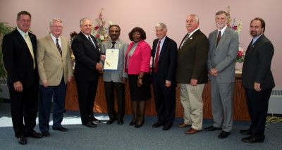 The Charles County Commissioners, State Senator Thomas “Mac” Middleton, Maryland Delegates Murray Levy and Peter Murphy, and County Administrator Paul W. Comfort, Esq. present Dr. Chinnadurai Devadason a proclamation for his outstanding service as the Health Officer of Charles and Queen Anne Counties.