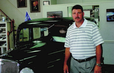 Gary Bell, of Bell Motor Co., says that tough economic times, caused in part by high energy prices, meant that making a profit on selling cars has become increasingly difficult. (Photo: Guy Leonard)