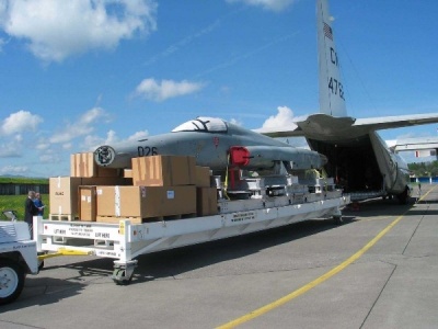 A disassembled former Swiss Air Force F-5 Freedom Fighter is ready for loading on a U.S. Navy C-130T for the flight back to the United States. (Submitted photo)