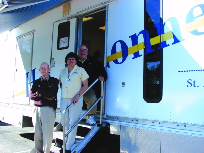 (pictured from left) Dr. Patrick Jarboe, Renee Shively, RN, and Phil Caroselli, the Mobile Outreach Center driver. (Submitted photo)