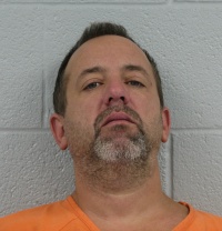 Lewis Charles Johns, 45, of Chesapeake Beach, was arrested on Dec. 3 in connection with a robbery at the Sunderland Wine and Spirits store the day before.