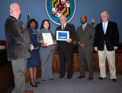 The Charles County Commissioners present Ms. Brianna Bowling, owner and founder of Zekiah Technologies, with the December 2008 “Soar Like an Eagle Entrepreneur of the Month” award. (Submitted photo)