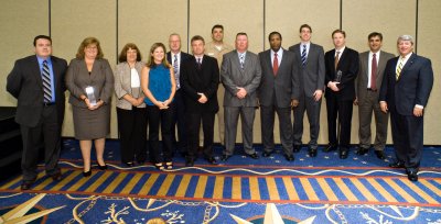 The Aviation Support Equipment program office’s Consolidated Automated Support System Performance-Based Logistics Team has won the 2009 Secretary of Defense Performance-Based Logistics Award in the system category. The winning team members (from left to right): Chris Giggey, Christine Rowlands, Cathy Eggles, Kathryn Murtagh, Carl Ruzicka, Rich Kasilowski, Cmdr. Bob Stailey, Wade Wendall, Oliver Johnson, Jeff Stingle, Harley Bieber, Randy Core and Dale Bennett. (Photo courtesy NAVAIR)