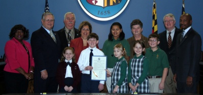 The Charles County Commissioners present a proclamation to Ms. Judy Delucco, Principal of St. Peter’s Elementary School, Ms. Judy Melvin, Development Director at Archbishop Neale School, and several Catholic school students, designating Sunday, January 25 through Saturday, January 31 as Catholic Schools Week in Charles County. The proclamation recognizes the four Catholic elementary schools in the Charles County region of the Archdiocese of Washington for providing excellent educational programs, promoting moral and spiritual values, and nurturing self-discipline based on respect. (Photo: Crystal Hill)