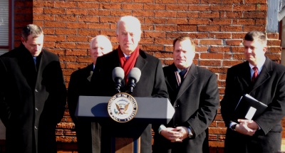 Vice President Joe Biden traveled to Laurel on Thursday to urge passage of the economic stimulus legislation currently being debated in the Senate. Behind him, from left, are Maryland Gov. Martin O'Malley, Maryland Democratic Sen. Ben Cardin, an unidentified man and Maryland Transportation Secretary John Porcari. (Photo: Leonard Sparks, CNS)