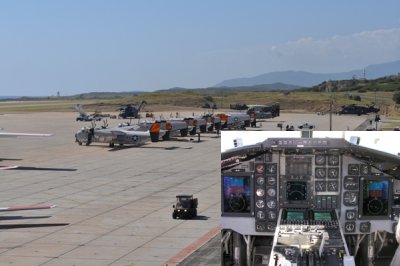 Equipment and supplies are loaded onto a C-2A Greyhound assigned to the Rawhides of Fleet Logistical Support Squadron (VRC) 40 at the airfield at Naval Station Guantanamo Bay. The Rawhides are transporting personnel to the aircraft carrier USS Carl Vinson (CVN 70) to support disaster relief efforts following a 7.0 magnitude earthquake in Haiti on Jan. 12, 2010. (U.S. Navy photo by Chief Mass Communication Specialist Bill Mesta/Released) INSET: C-2A Greyhound updated Communication Navigation Surveillance/Air Traffic Management (CNS/ATM) cockpit. (U.S. Navy photo)