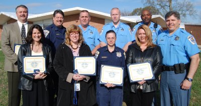 Some of the employees of the St. Mary's County Sheriff's Office who were honored for their long length of service on Tuesday. From left: Lt. Belleavoine, Sgt. Mileto, Capt. Merican, Lt. Hall, Cpl. Somerville, Ms. Kaspar, Ms. Thompson, Sgt. Morazes, Ms. Quade, Sheriff Cameron. (Submitted photo)