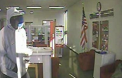 This poor quality bank surveillance photo shows one of the two suspects who robbed the Lexington park branch of Bank of America Wednesday morning.