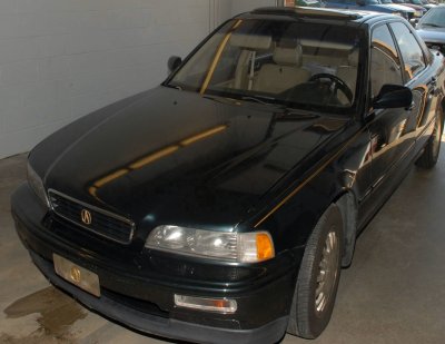 Police say the two bank robbery suspects used this Acura to flee the bank and then abandoned it, escaping in a dark colored sedan. (Police photo)