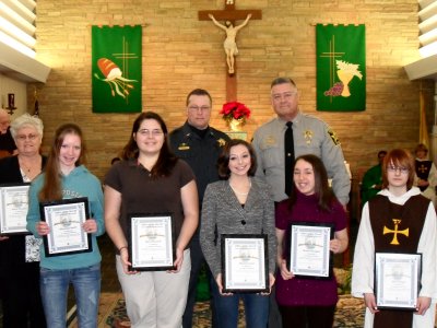Back Row: Lt. McDowell, Sheriff Evans. Front Row: Bunny Tate, Marleigh Smith, Aley Villarreal, Christina Graf, Shaina Glasgow, Sarah Hugel. Not Pictured: Karen Macken. (Submitted photo)