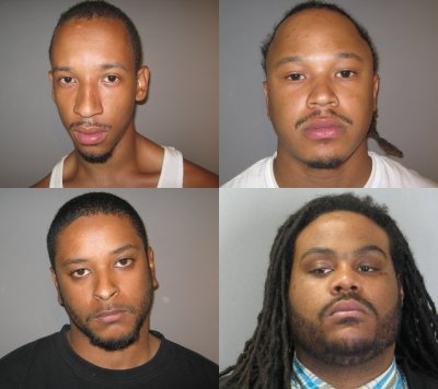 These four men were arrested in connection with the April 16 armed robbery of the Charlotte Hall Burger King. Clockwise from Top-left: Eric Woodland, Avery Lancaster, D'Antae Adams, and Mark Ferebee. (Arrest photos)
