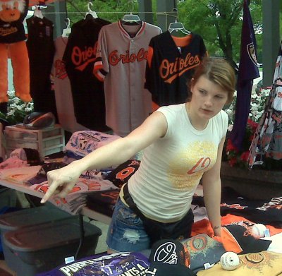Sara Walters sells Orioles items before a game at Oriole Park at Camden Yards. (Photo: Alexander Pyles)