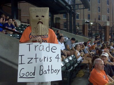 Brandon Crawford, 15, of Sykesville hides his shame for the Orioles by wearing a paper bag over his head during a game in late July. (Photo: Alexander Pyles)