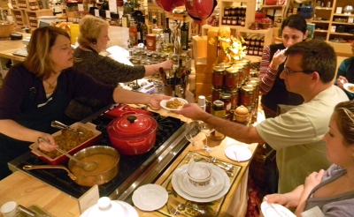 Cooking instructor Dana Kline hands out samples of stuffing made with fennel and hot Italian sausage. Sunday was the last of four Thanksgiving-themed cooking classes held at the Williams-Sonoma store at the Annapolis Mall. (Capital News Service Photo by Shannon Hoffman)