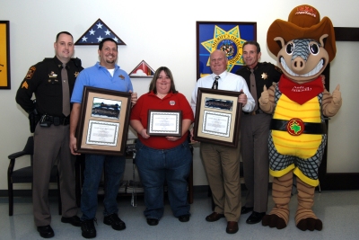 Pictured from left to right are Sgt. Chris Schmidt, a community policing unit supervisor who helped organize the Torch Run; Steve Urso, managing partner of Texas Roadhouse; Aileen Rose, operations manager for Rita’s of La Plata; John Flatley, owner/operator for Chick-fil-a of La Plata; Sheriff Rex Coffey and, of course, the ever-smiling mascot of Texas Roadhouse, Andy Armadillo. (Submitted photo)