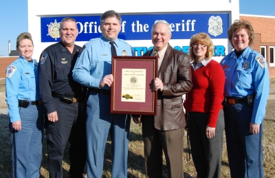 Pictured left to right: Captain Deborah Diedrich, Captain Michael Merican, Sheriff Timothy K. Cameron, Commissioner Daniel L. Morris, Ms. MaryAnn Thompson, and Captain Denise Hintze. (Submitted photo)