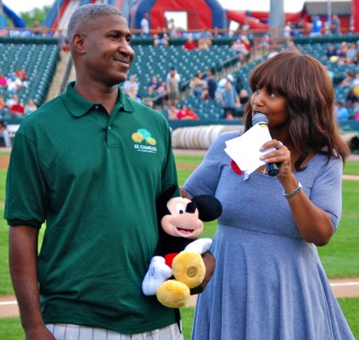 Disney World promotion winner Lester Jackson and My Magic DC 102.3 WMMJ radio DJ, Cortney Hicks, at the June 25 Maryland Blue Crabs game at the Regency Furniture Stadium in St. Charles. (Submitted photo)