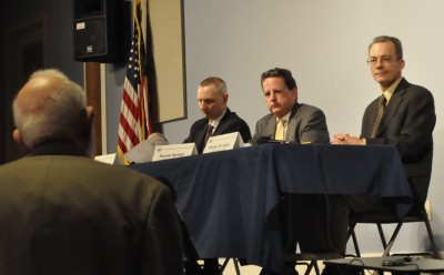 From left to right, Gary Arnold, Ronald Spritzer and William Sager of the Atomic Safety and Licensing Board listen to public testimony at Wednesday's public hearing on a third reactor for Calvert Cliffs Nuclear Power Plant. (Photo by Drew Grossman)