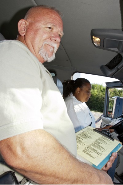 CSM Commercial Truck Driver Lead Instructor Eric “Mac” McCollum has his clipboard ready as he prepares to head out on the road with a student driver. “We want students to have every driving experience possible so that they are ready for many situations and road conditions,” said McCollum. “Over the seven-week course for Class-A licensure, students are pretty much guaranteed to drive in wind and rain. It’s great if we can provide snow and ice, but that’s not always possible—especially this past winter. As much as we train them, though, there will always be something that no one can train for.”