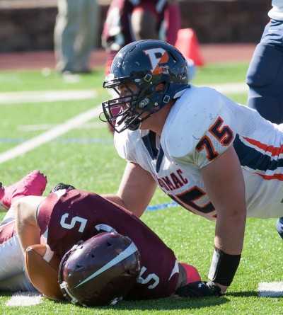The 280-pound Colton Haney looms over his opponent after a sack. Photo courtesy of Colton Haney.