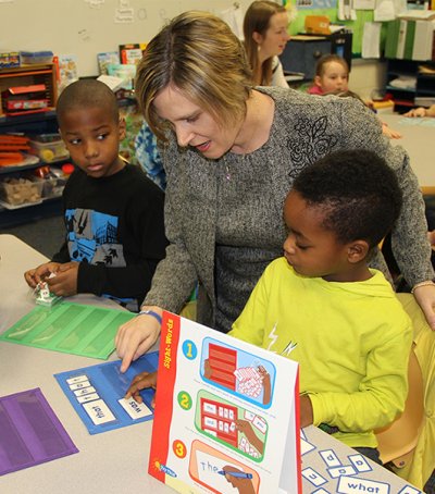 Mt. Hope/Nanjemoy Elementary School Principal Kristin Shields, pictured with a group of Mt. Hope/Nanjemoy students, is the 2014 Charles County Public Schools Principal of the Year and this year’s county recipient of the Washington Post’s Distinguished Educational Leadership Award.