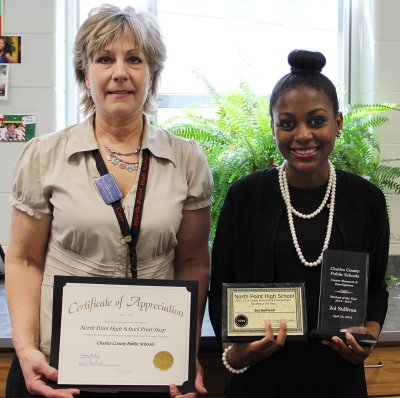 Pictured right is Joi Sullivan, the 2014 Career Research and Development (CRD) Student of the Year, with her supervisor Sandra Carr, left, who manages the print shop at North Point High School and oversees Sullivan in her job duties.