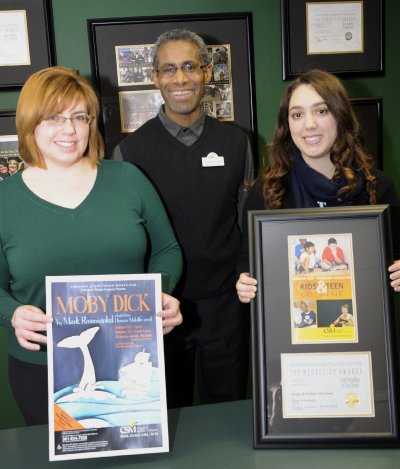 CSM’s award-winning Creative Services team of Director Michael Shelton, center, Graphic Designer Lisa Jones with her design of “Moby Dick” and Junior Graphic Designer Katherine Reyes with her design of the 2013 Kids’ and Teen College Catalog, earned Bronze Medallions of Excellence from the National Council for Marketing and Public Relations.