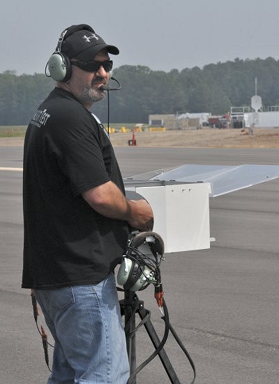 Frank Paules, a contractor assigned to the Unmanned Aerial Systems Test Directorate, pilots an Aerostar UAS during testing at Naval Support Facility Dahlgren on May 22. (U.S. Navy photo by Andrew Revelos/Released)