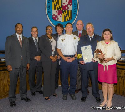 Pictured, left to right: Commissioner Vice President Reuben B. Collins, II (District 3); Commissioner Bobby Rucci (District 4); Commissioner Debra M. Davis, Esq. (District 2); Commissioner Ken Robinson (District 1); Chief John Filer, Charles County EMS; Charles County Director of Emergency Services Bill Stephens; Chief Brent Huber, Charles County Association of EMS; Commissioner President Candice Quinn Kelly.