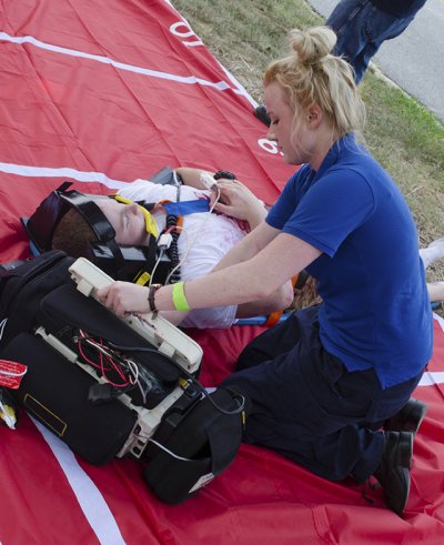 College of Southern Maryland EMS student Meagan McCurry, of Sunderland, monitors a victim during a drill at the La Plata Campus involving first responders and agencies from Calvert, Charles and St. Mary’s counties on Aug. 9. (Submitted photo)