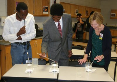 North Point High School seniors Njuguna Thande, left, and Christain Barnes, center, were recently named semifinalists in the National Achievement Scholarship Program. Also pictured is Cheryl Swartzwelder, right, an engineering teacher at North Point. Both Thande and Barnes were students of Swartzwelder’s and credit her as a source of support for their interest in pursuing a career in engineering.