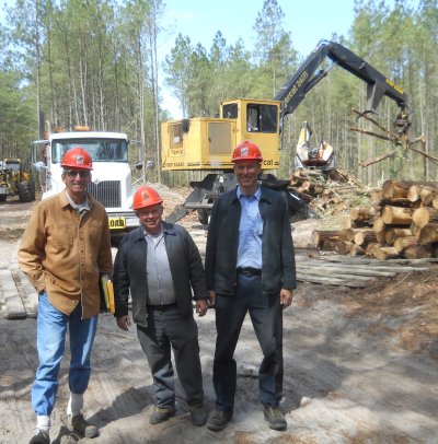 Eddie Moore, middle, was Logger of the Year in 2013. Pictured with Moore are Mike Fercucci, senior Forest Stewardship Council-Sustainable Forestry Initiative auditor and logger Auther Egolf who serves on the Chesapeake Forest Advisory Board and was Logger of the Year in 1995. (Photo: Max Bennett)