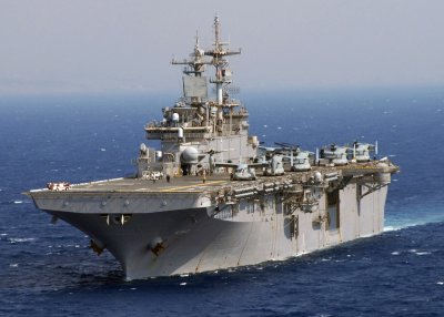 U.S. Marine Corps MV-22 Ospreys preparing for flight on the deck of the multipurpose amphibious assault ship USS Wasp (LHD 1). The ship's Combat Information Center (CIC) space is currently being analyzed by human systems integration engineers at Naval Surface Warfare Center Dahlgren Division. They plan to reconfigure the CIC to maximize operational effectiveness and optimize the work performance at individual watch stations.