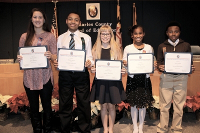 Pictured are five Charles County Public Schools students honored by the Board of Education on Dec. 8 for their accomplishments in academic achievement, career readiness and personal responsibility. Pictured, from left, are: Courtney Alvey, senior, Henry E. Lackey High School; Tremaine Barrow, eighth grade, John Hanson Middle School; Raelynn Hood, fifth grade, T.C. Martin Elementary School; Aliyona Naves, fifth grade, Dr. Gustavus Brown Elementary School; and Tyrone Hudson, fifth grade, C. Paul Barnhart Elementary School.