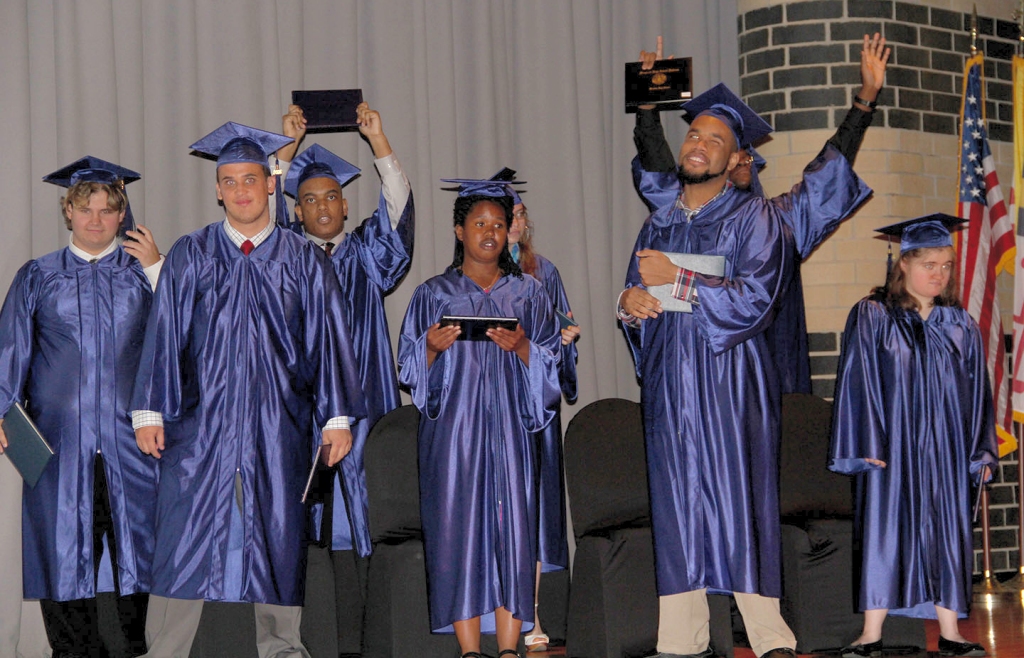 Charles County Public Schools honored eight students in the Adult Independence Program, known as AIP, during a graduation ceremony held May 20 at North Point High School. The AIP Class of 2016 includes students, pictured from left, Nicholas Adriani, Robert Mullins, Isaac Green, Tiskisha Robison, Crystal Adkins, Stephon McClellan-Dempsey, Elisha "Eli" Frimpong and Alice Whitney.