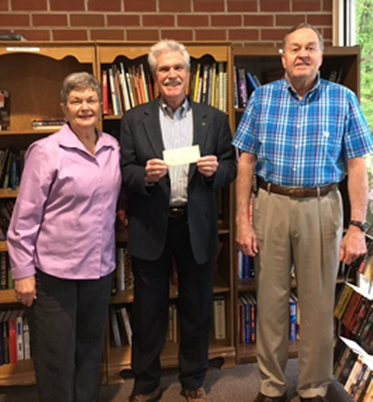 From left to right: Shirley Havelka, store manager for SMILE; Rich Fleming, interim Rotary Club president; and Bruce Robinson, board president of SMILE. (Submitted photo)