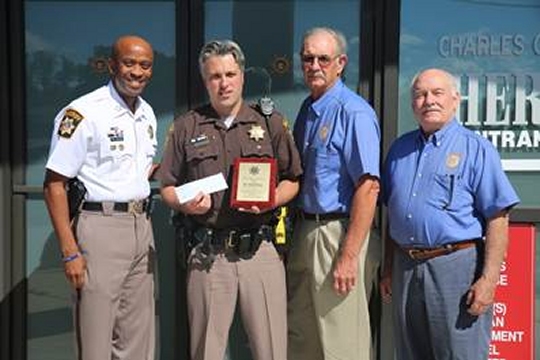 From left to right: Sheriff Troy Berry, Pfc. Vernon Warker, First Vice Commander G. Gale Willett, and Adjutant Gary Shupe.