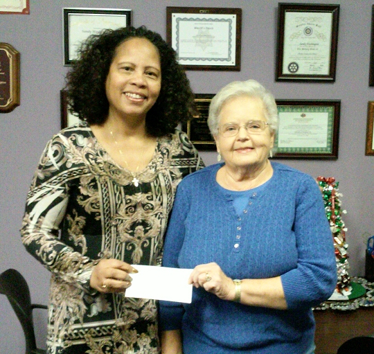 Kitty Dawson, Chairman of National Security and VA&R Programs for American Legion Auxiliary Unit 82, based in La Plata (on right) presents a $1,000 donation to Sandy Washington of LifeStyles, Inc. (Submitted photo)