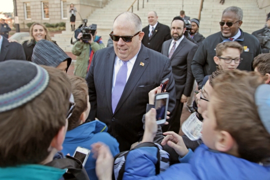 Gov. Larry Hogan is swarmed by children in Annapolis as a part of non-public school advocacy day on March 2, 2017. An estimated 1,800 children came to speak with legislators about the program that provides funding for non-public schools throughout the state. (Photo: Hannah Klarner)