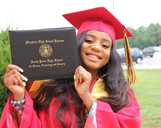 Cheyanne Hayes, a graduate of North Point High School, shows off her diploma after graduating this summer.
