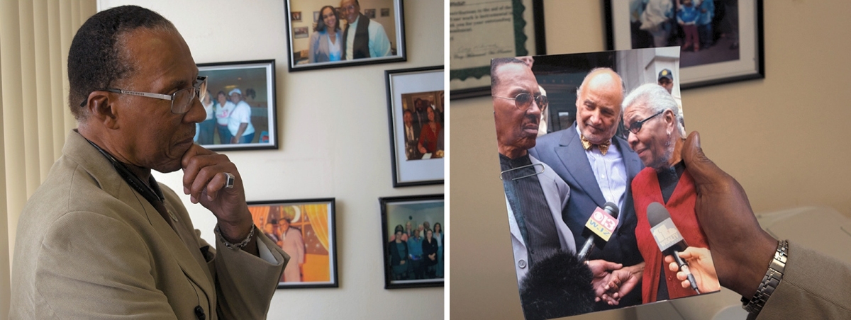 LEFT: Walter Lomax, 70, was wrongly incarcerated for close to 40 years of his life. Here, on Nov. 8, 2017, he stands in his Baltimore office of the Maryland Restorative Justice Initiative, an organization that fights for the rights of people with parole-eligible life sentences.

RIGHT: Lomax on Nov. 8, 2017, holds a 2014 photo of him and his sister from the day he was exonerated. (Photos: Julie Depenbrock)