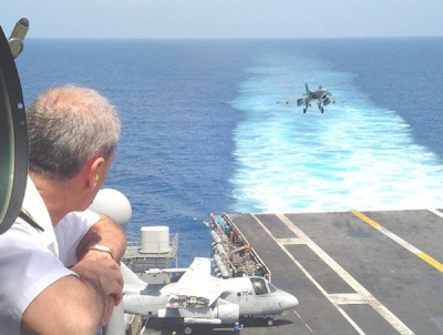 Mediterranean Sea (July 23, 2007) - Chief of French Naval Staff, Admiral Oudot de Dainville, observes a French Rafale M combat aircraft from the French nuclear-powered aircraft carrier Charles de Gaulle as it lands on the flight deck of the nuclear-powered aircraft carrier USS Enterprise (CVN 65). Enterprise and embarked Carrier Air Wing (CVW) 1 are currently underway on a scheduled six-month deployment. U.S. Navy photo by Mass Communication Specialist 3rd Class N.C. Kaylor.