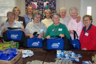 Retired and Senior Volunteer Program (RSVP) volunteers donated the time needed to fill each bag with supplies. Back Row (L to R): Dianne Moison, RN, St. Mary’s County Health Department bioterrorism coordinator; Jayne Hunsinger, Department of Aging manager; Jennie Page, Department of Aging deputy director; RSVP volunteers Lorraine Irwin and Janice Hayden. Front Row (L to R): Volunteers Ann Thomas, Clara Norris, Susanna Wolf and Elsie Marlin.