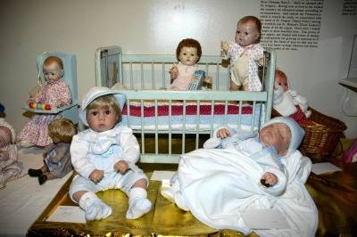 A small sample of the dolls on display at a prior year's annual Holiday Christmas Doll and Train Exhibit at the St. Clement’s Island Museum in Colton’s Point. (somd.com File Photo)