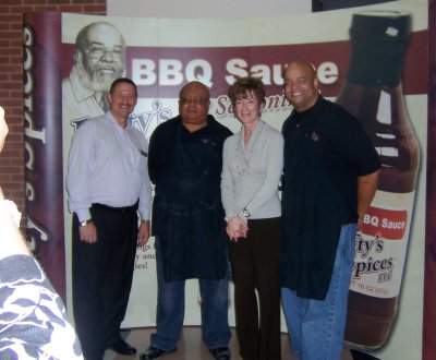 Left to right: Giant Regional Market Manager Gary Budd, Lefty's Barbeque founder Walter Nash Sr., Giant Executive Vice President and General Manager Robin Michel, and Lefty's Spices CEO Walter Nash Jr. at Giant Food's corporate headquarters in Landover, Maryland.