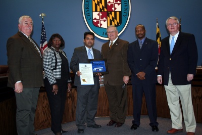 The Charles County Board of Commissioners present February's "Soar Like an Eagle Entrepreneur of the Month" plaque and proclamation to local businessman, Sonny Patel, President and CEO of Crossroads Hospitality. (Photo: George Clarkson)