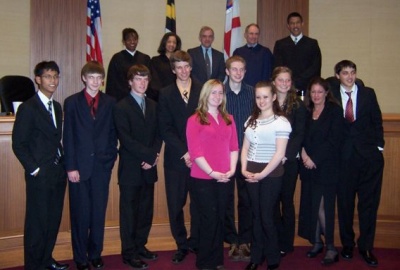 The St. Mary's Ryken Mock Trial Team. Front row L-R: Jose Ablen, John Houser, Daniel Burke, Ryan Fleming, Kristina Mooney, Josh Wagner, Tara Hamilton, Alexa Woods, teacher/coach, Leeanne Carr, Ryan Kelley. Back row L-R: The Honorable Crystal D. Mittelstaedt, The Honorable Tiffany C. Hanna-Anderson, Attorney/Coach, Samuel C. P. Baldwin, Jr., Esq., The Honorable James P. Salmon, The Honorable E. Gregory Wells. (Submitted photo)